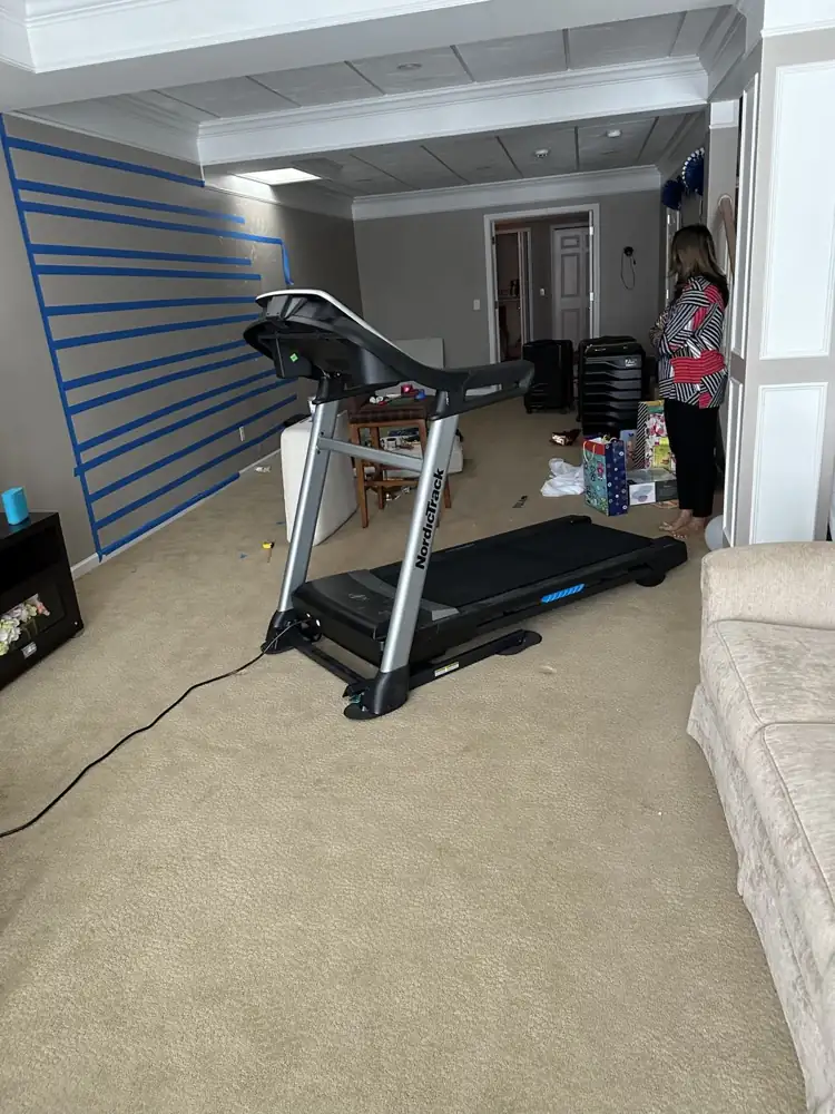 Basement family room with carpet before remodel, Bedford, Ohio