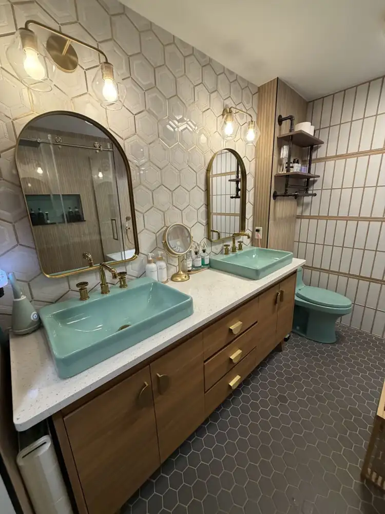 Another view: Bathroom with shoji-style tile wall, freestanding tub, glass shower with fluted wood-look tile, hex floor and turquoise fixtures, Chagrin Falls, Ohio