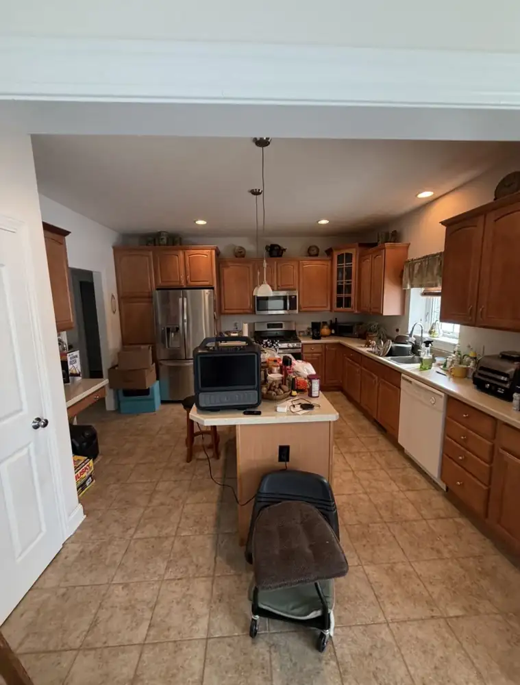 Kitchen with honey oak cabinets, laminate counters and beige tile floor before remodel, Macedonia, Ohio