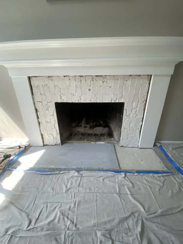 Fireplace surround stripped to old brick during remodel, Northeast Ohio