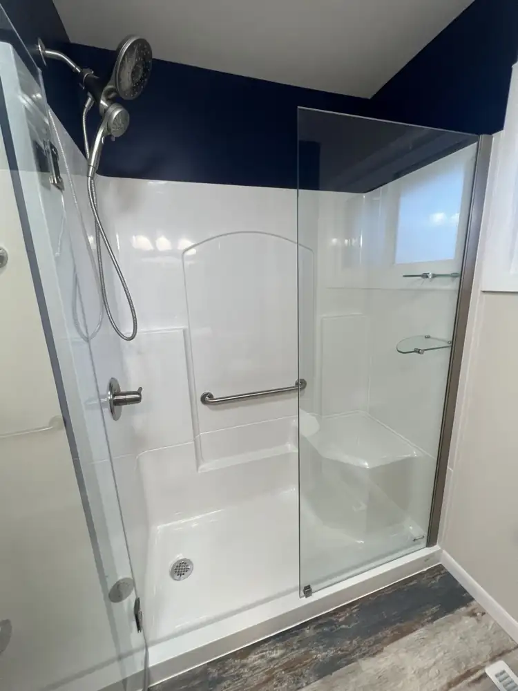 Walk-in shower with built-in seat, grab bar, glass shelves and handheld shower, Northeast Ohio