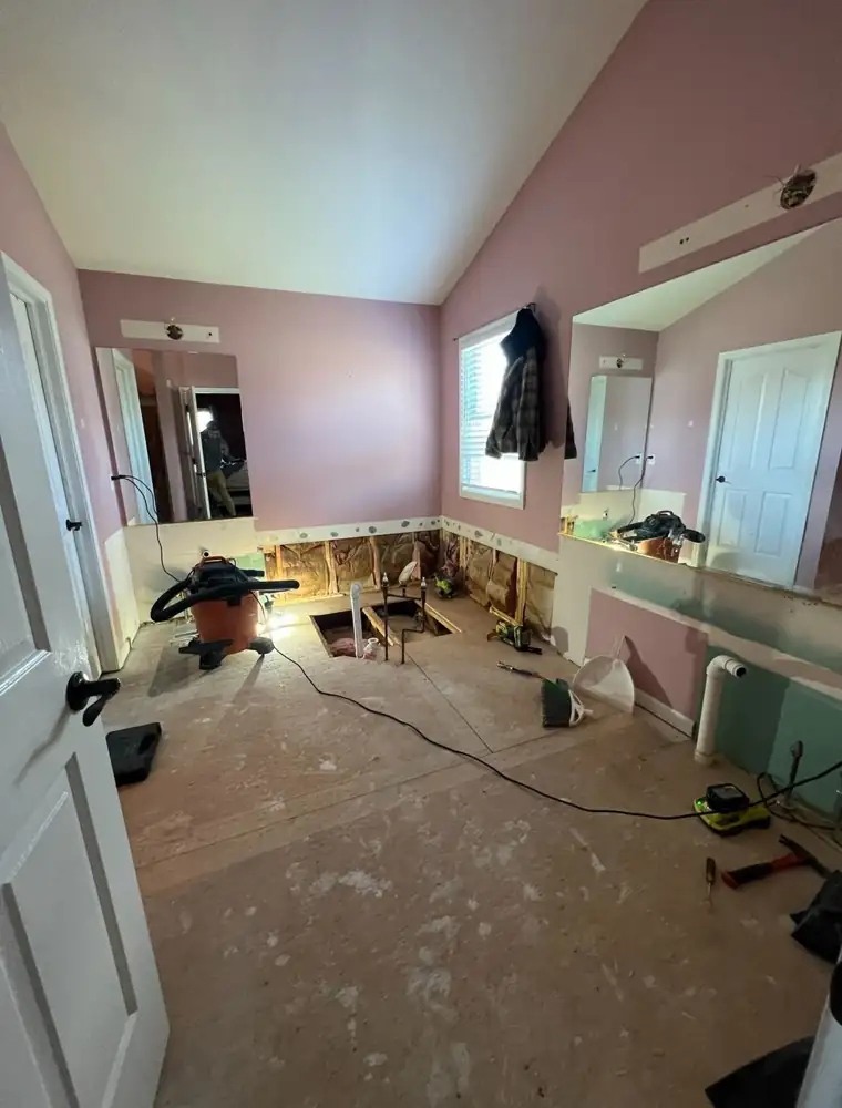 Primary bathroom gutted to the subfloor with plumbing moved during remodel, Northeast Ohio