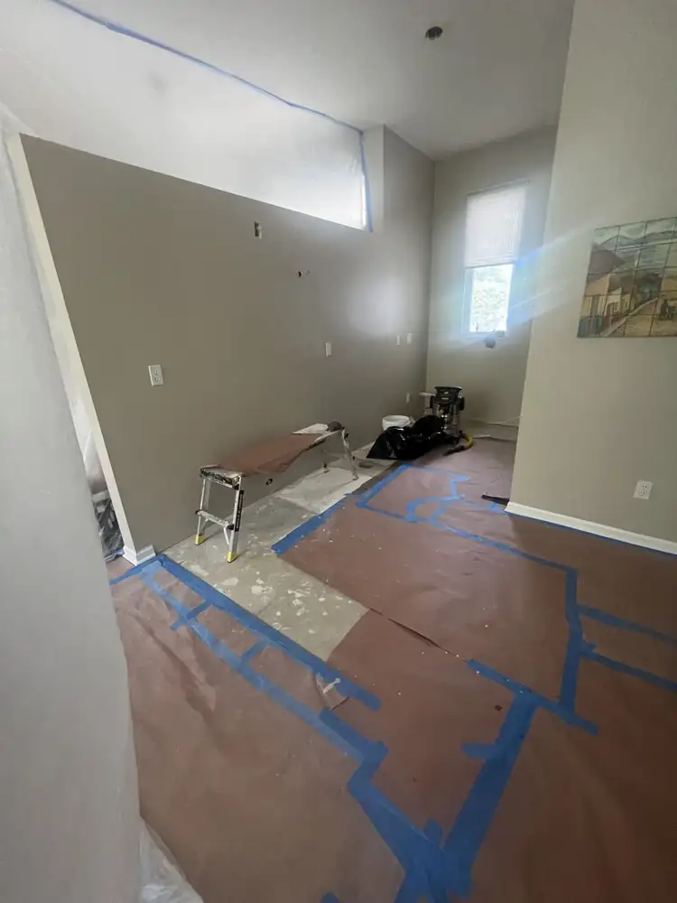 Kitchen emptied to the subfloor with walls prepped before new cabinets, Northeast Ohio