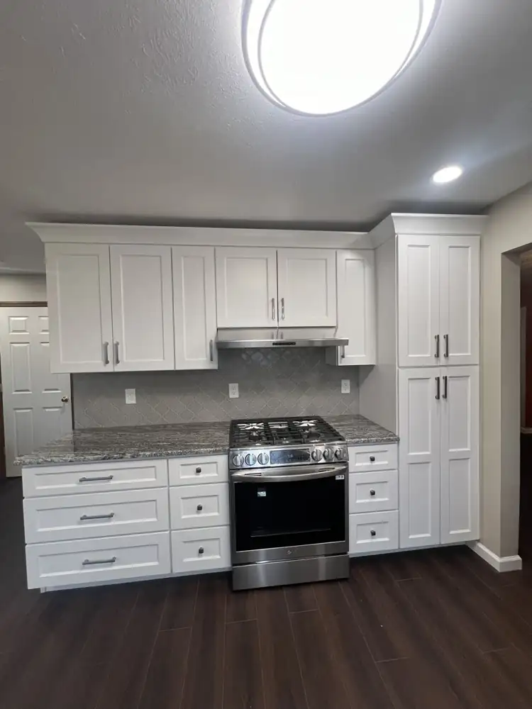 Kitchen with white shaker cabinets to the ceiling, Rocky River