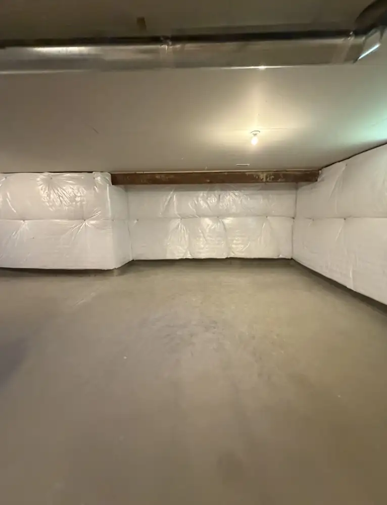 Basement with insulated walls and bare concrete floor before finishing, Solon, Ohio