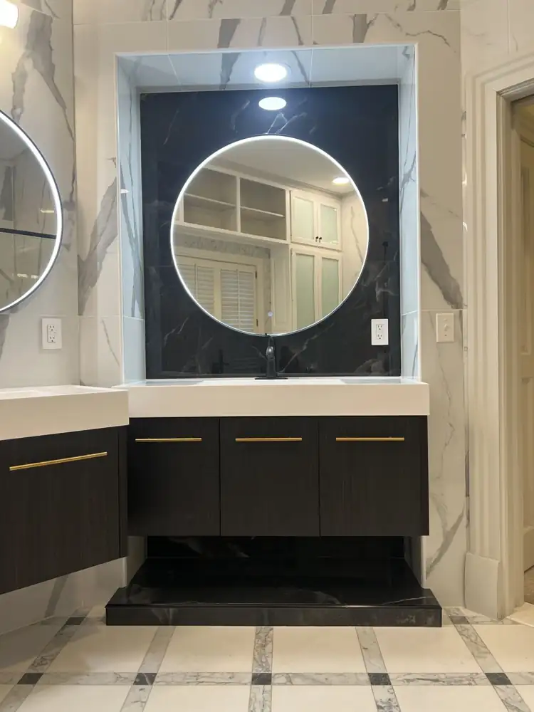 Another view: Primary bathroom with glass shower, LED ceiling rain head, body jets, black marble-look floor and freestanding tub on a lit platform, Strongsville, Ohio